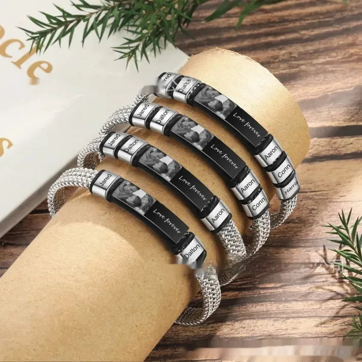 Men's titanium steel lettering bracelet with leather rope strap and heart charm, showing engraved bead options.
