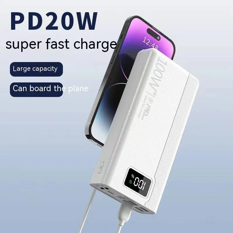 Black and white large capacity power bank with fast charging, showing size comparison