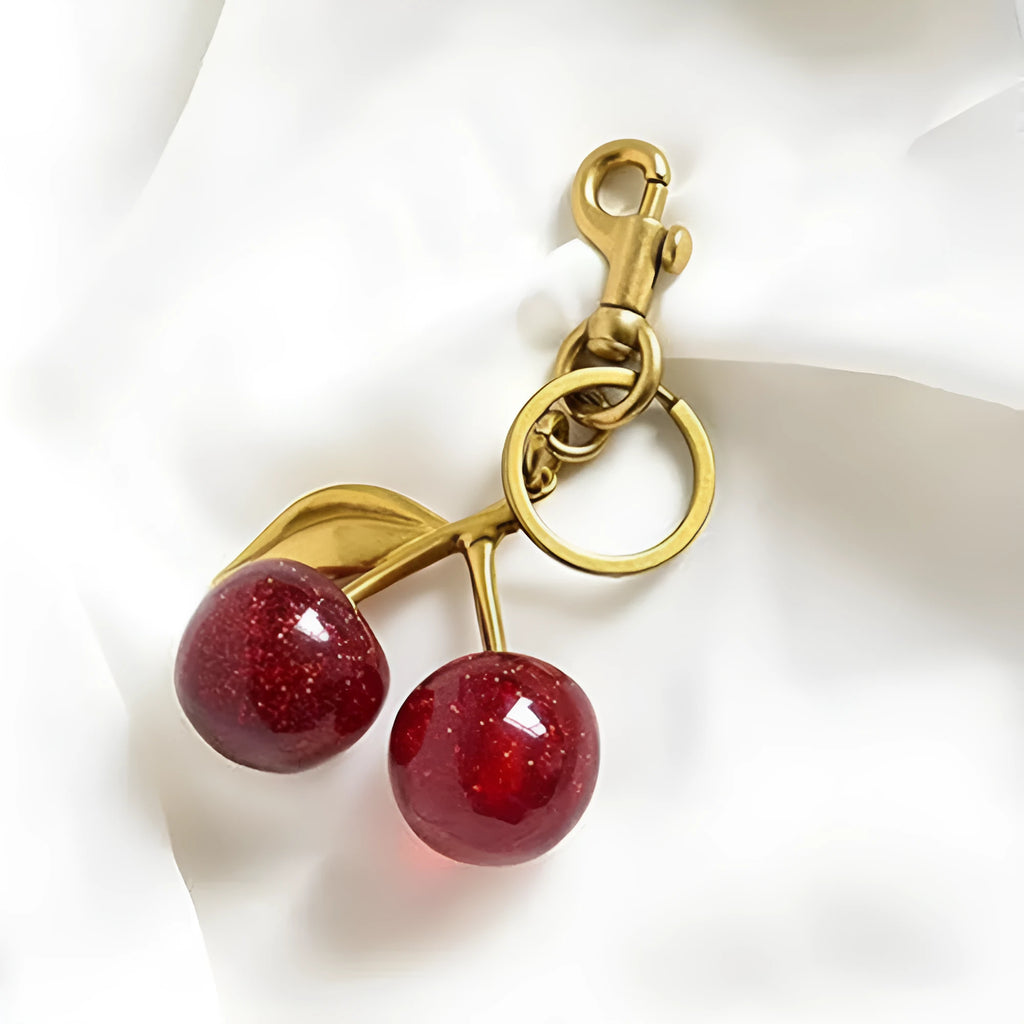 Zinc alloy cherry blossom key ring pendant in pink or red colour options