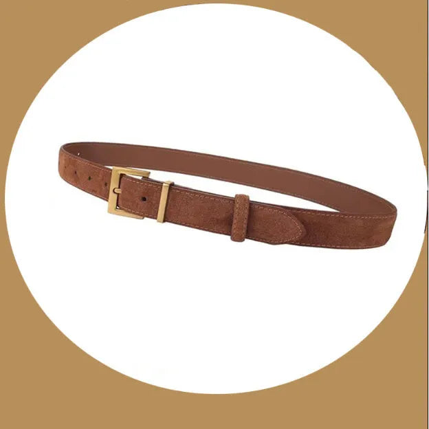 Ladies black genuine leather belt with a silver quadrilateral pin buckle on a white background.