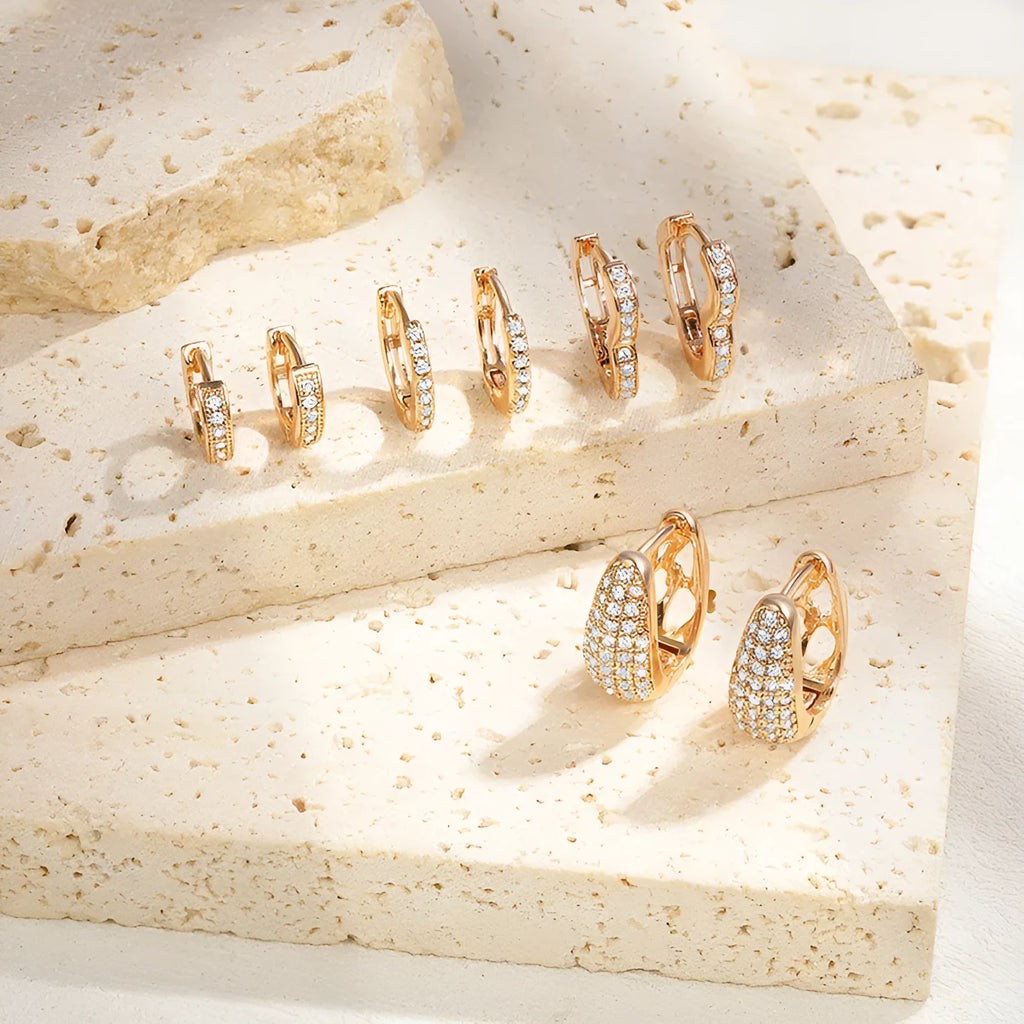 Heart-shaped copper ear clip earrings with brass gold plating and gang drill elements