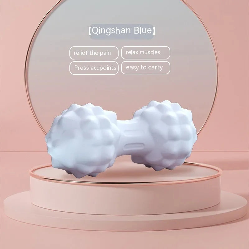 Blue TPR foot massage ball with 6cm diameter on a plain background