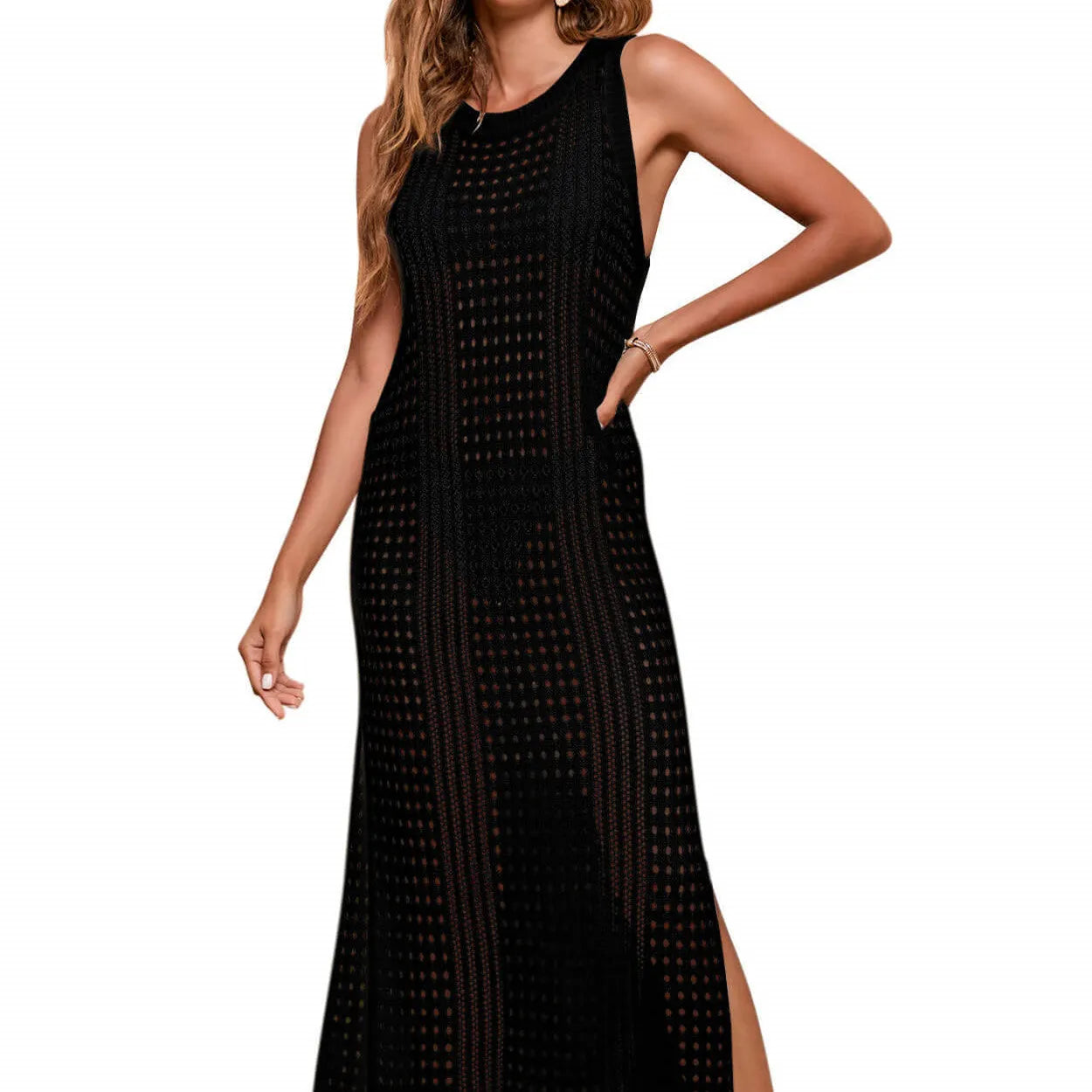 Long loose knitted beach blouse for women in a solid colour with a hollow-out design.