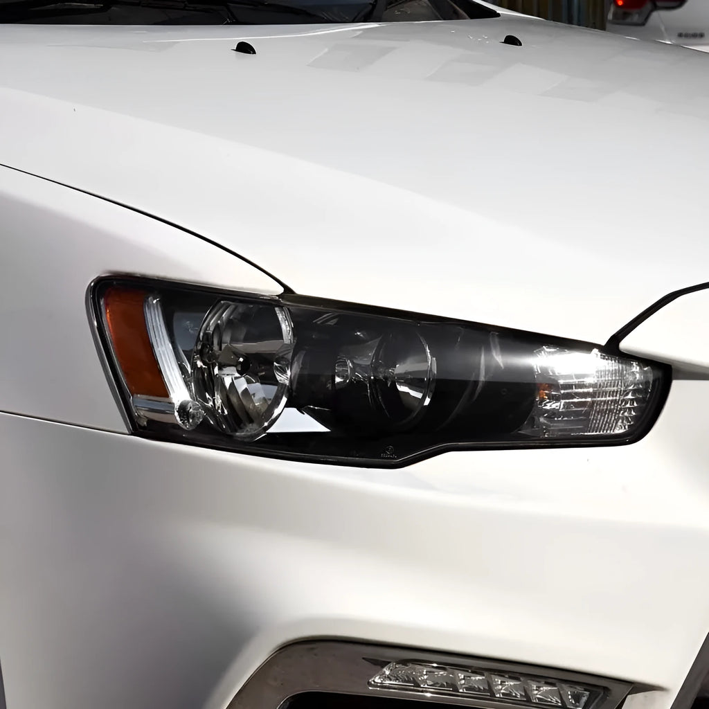 Transparent plastic headlight housing cover measuring 50x30x20mm for vehicle lampshade protection