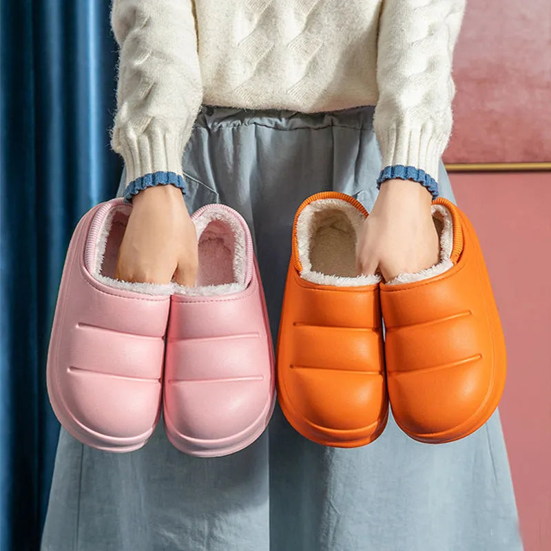 Women's waterproof EVA garden slippers in assorted colours with plush lining and non-slip soles.